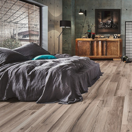 The Wilderness Oak Long & Wide Laminate Flooring - 12mm features Long planks, AC5 rated, scratch-resistant with V-groove bevels.
