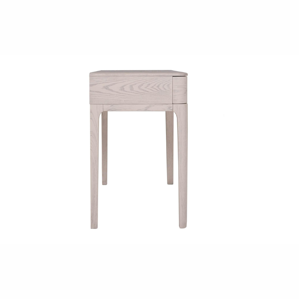 The Zahra Dressing Table with 2 Drawers in Parisian Cream features a refined oak finish and is perfect for storing essentials.