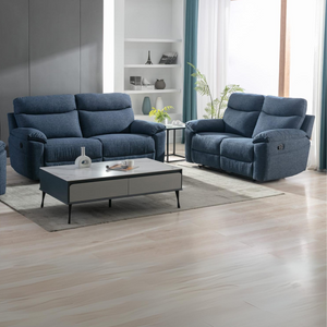 The Vera Sofa Set in Dark Blue is upholstered in dark blue and premium materials, plush cushions and spacious seating