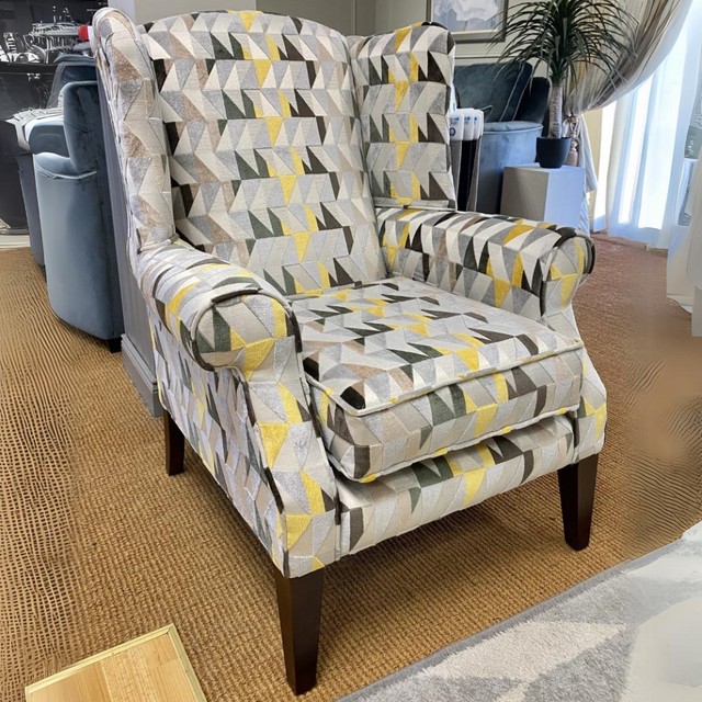 The Duchess Fabric Armchair is handmade in Ireland featuring aqua clean materials for easy cleaning with entirely custom choices.