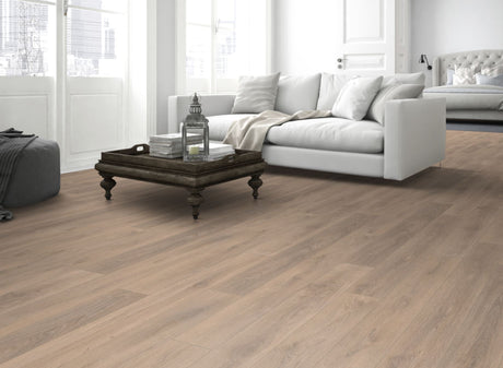 Blonde Oak Laminate Flooring - 8mm, realistic wood look, AC4 wear rating, 20-year guarantee, underfloor heating compatible, ideal for homes and commercial spaces.