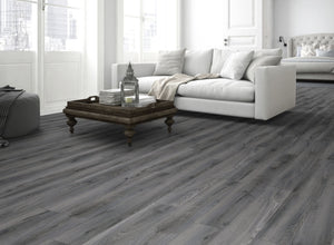 The Tomahawk Oak Laminate Flooring - 12mm features AC4 wear rating, antibacterial, realistic wood look, 20-year guarantee, underfloor heating compatible, Click2go locking system.