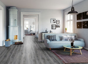 The Tomahawk Oak Laminate Flooring - 12mm features AC4 wear rating, antibacterial, realistic wood look, 20-year guarantee, underfloor heating compatible, Click2go locking system.