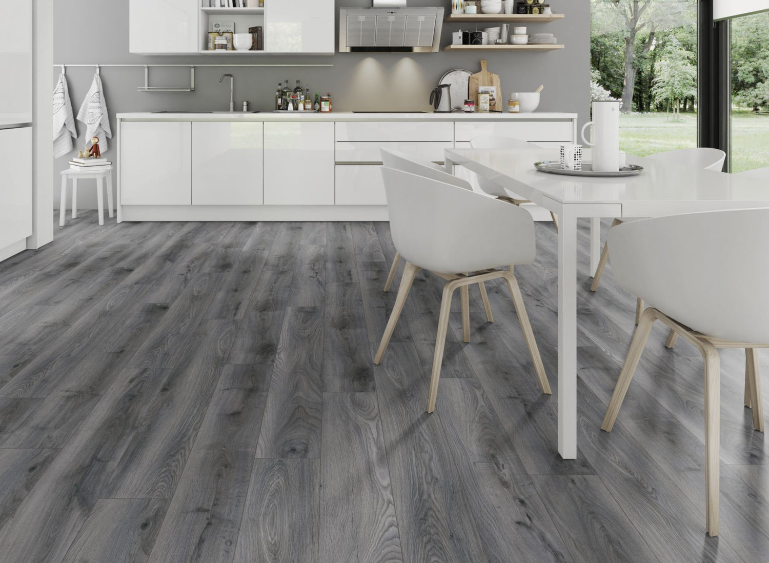 The Tomahawk Oak Laminate Flooring - 12mm features AC4 wear rating, antibacterial, realistic wood look, 20-year guarantee, underfloor heating compatible, Click2go locking system.