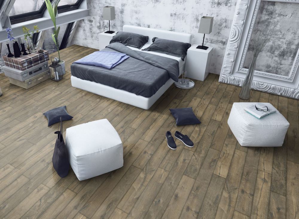The Oak Posino Gloss Laminate Flooring - 8mm features high-gloss oak finish, AC4 durability and underfloor heating compatible.