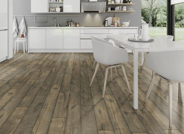 The Oak Posino Gloss Laminate Flooring - 8mm features high-gloss oak finish, AC4 durability and underfloor heating compatible.