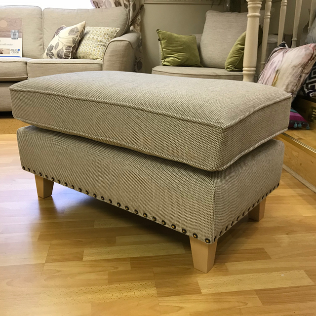 The Madeline Fabric Footstool with Studs is handmade in Ireland offers aqua clean materials for easy cleaning & custom choices