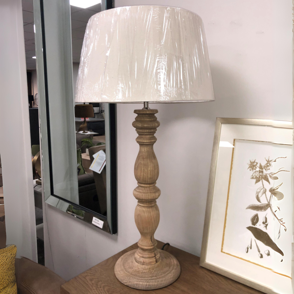 The Natural Wooden Lamp, standing tall at 82cm – has a sleek slender design and crafted from natural wood