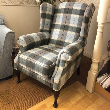 The Queen Ann Armchair is handmade in Ireland and features aqua clean materials, plush cushioning and durable frame.