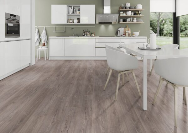 Sterling oak laminate flooring in a kitchen with table and chairs