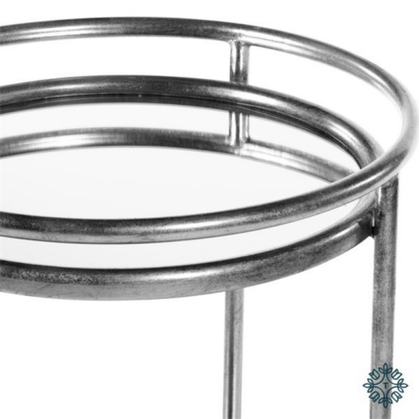 The Amelia Side Table featuring a mirrored surface and silver finish
