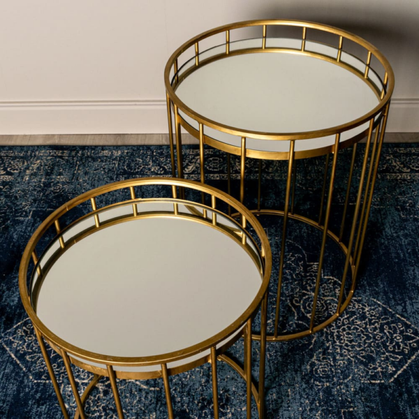 the Caged Table in Gold featuring a unique caged design with a gleaming gold finish