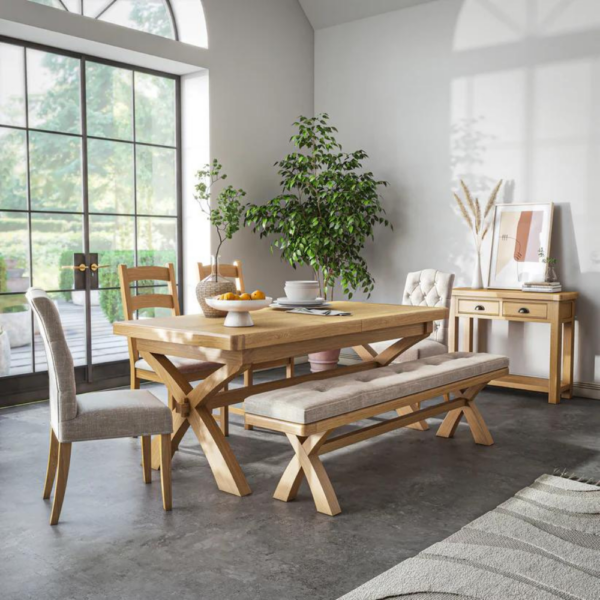 The Normandy Cross Leg Dining Table Extendable is crafted with solid oak frames and real oak veneers.