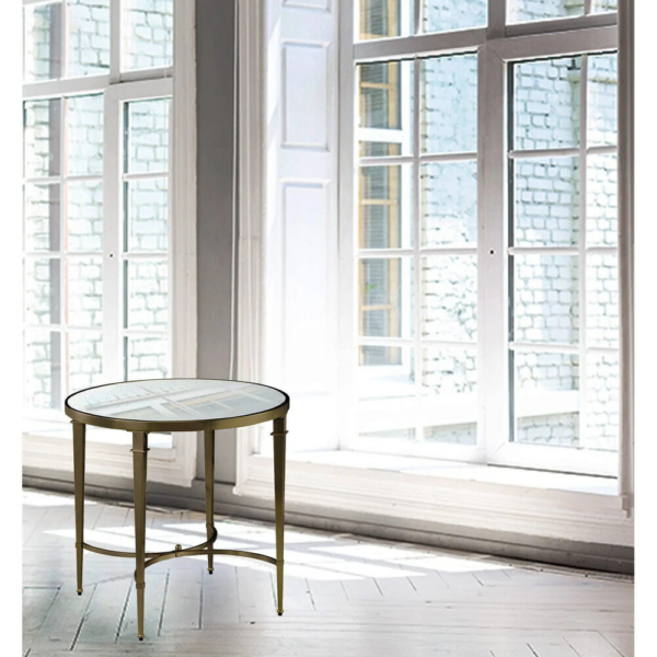 The Waverly Side Table Mirrored features an antique brass finish and a round bevelled mirror table top